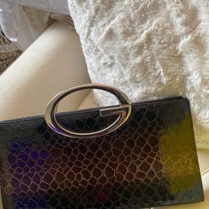 Crocodile imitation clutch bag